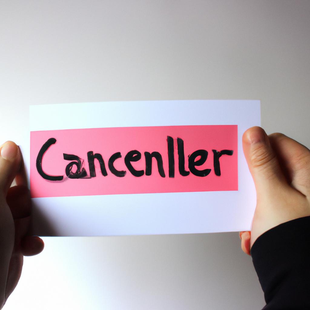 Person holding a cancellation sign