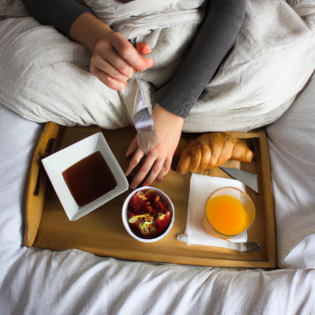 Person enjoying breakfast in bed