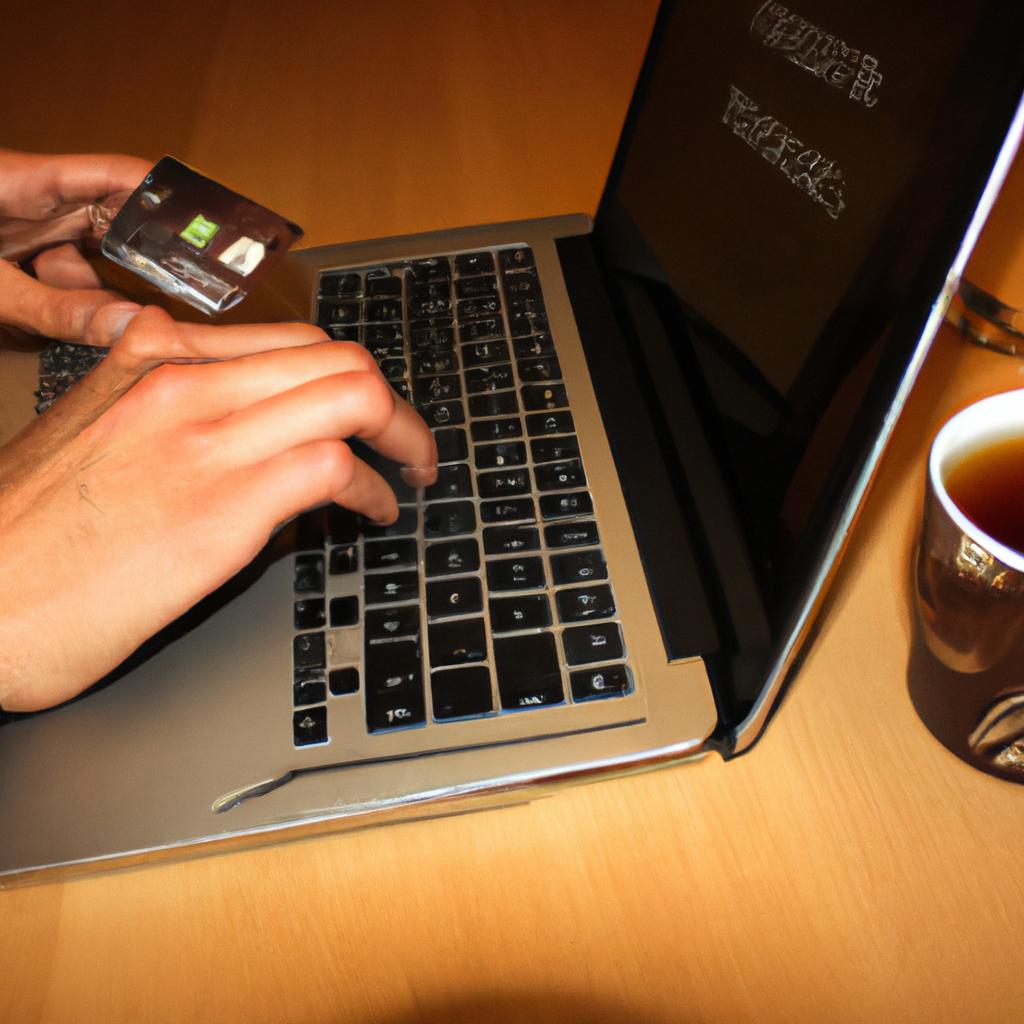 Person using laptop for payment